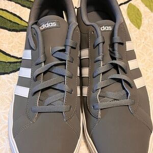 Adidas Gray Sneakers with White Stripes and Minimalist Design